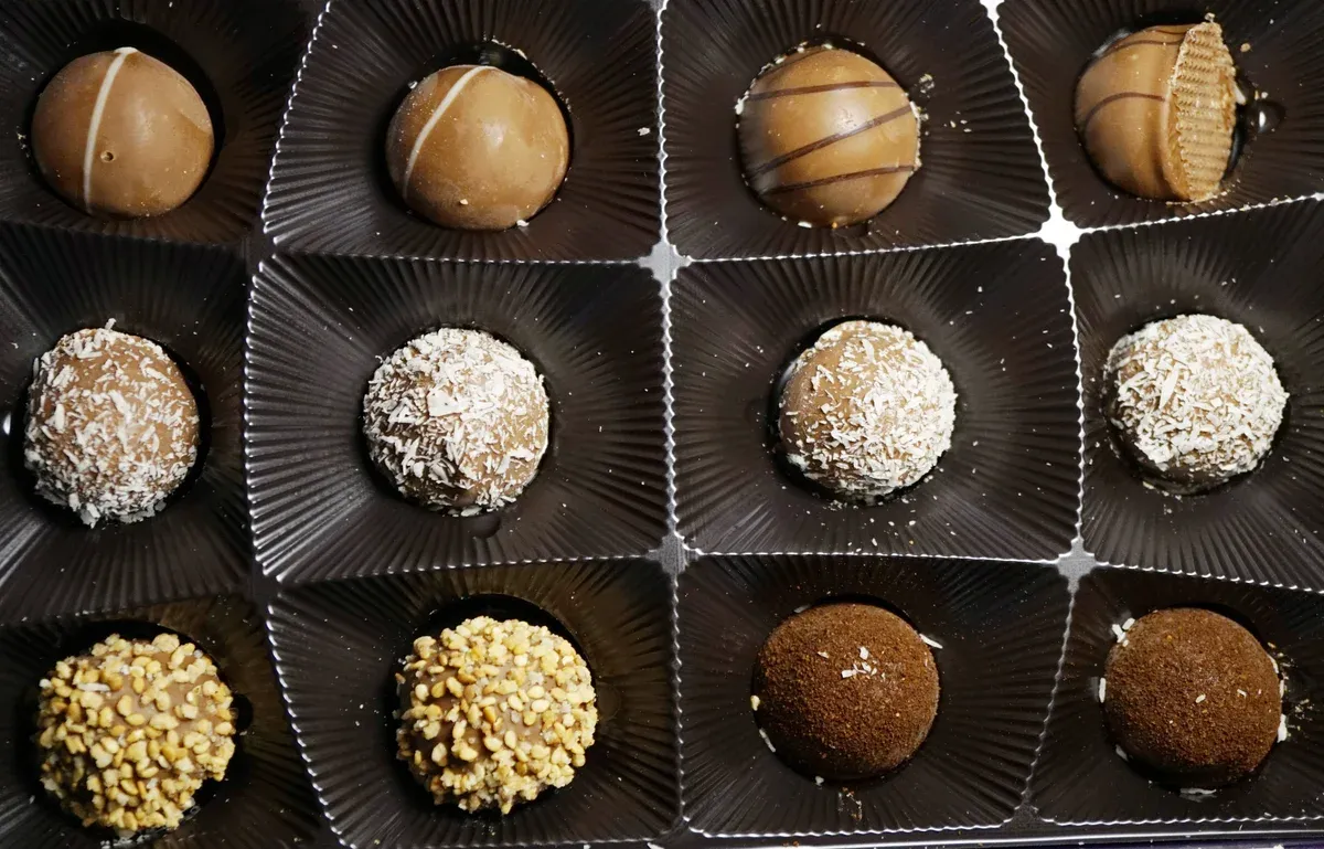 Box of finished chocolate truffles like those made in a truffle workshop on chocolate tours in Brussels